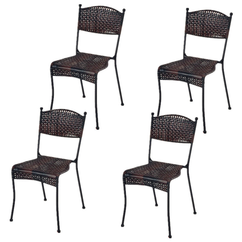 Tropical Dining Side Chair in Brown/Black Plastic with Open Back