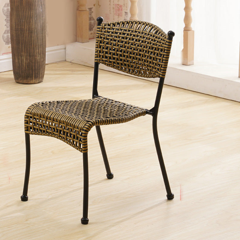 Tropical Dining Side Chair in Brown/Black Plastic with Open Back