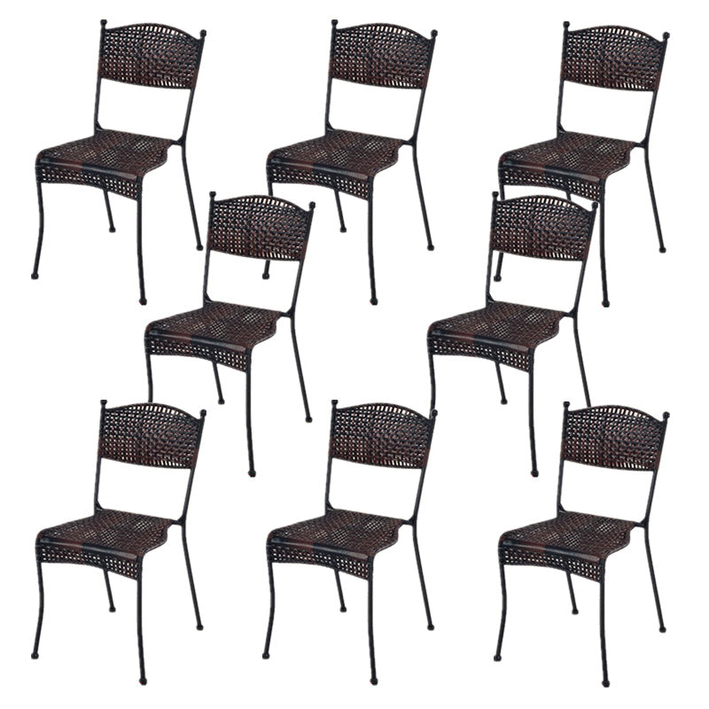 Tropical Dining Side Chair in Brown/Black Plastic with Open Back