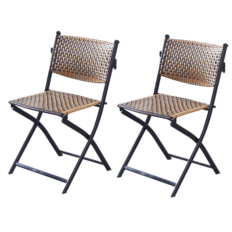 Tropical Dining Side Chair in Brown/Black Plastic with Open Back