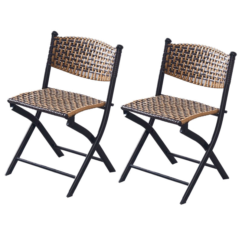 Tropical Dining Side Chair in Brown/Black Plastic with Open Back