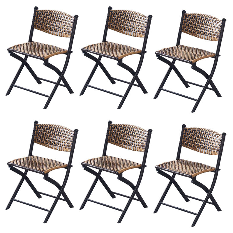 Tropical Dining Side Chair in Brown/Black Plastic with Open Back