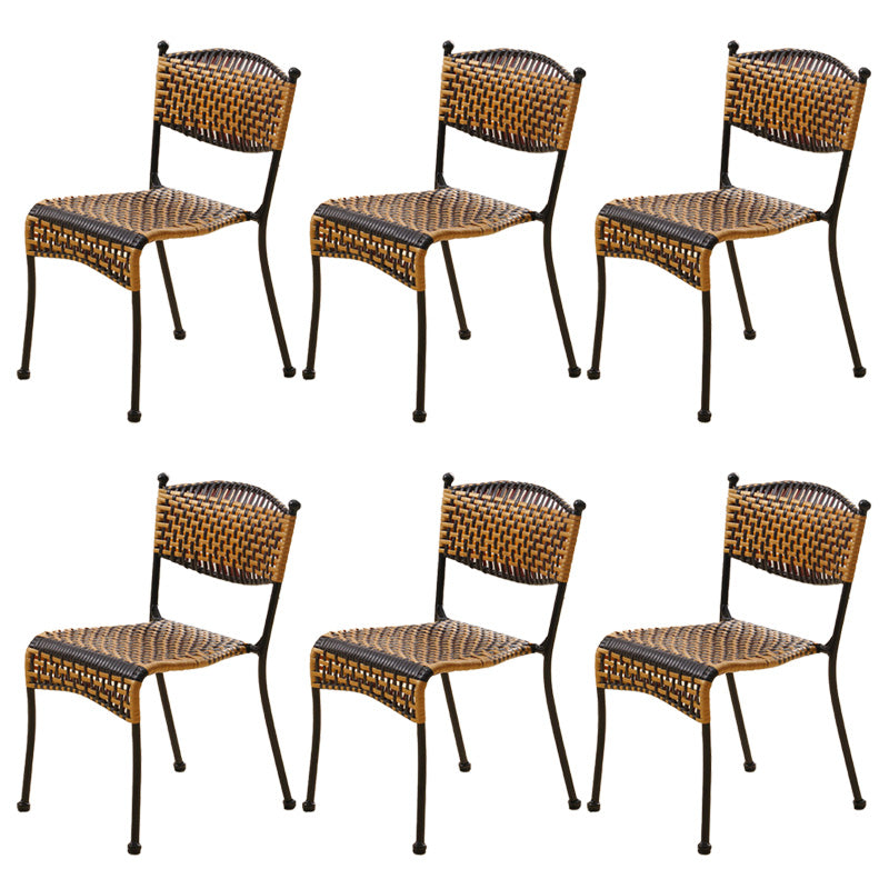 Tropical Dining Side Chair in Brown/Black Plastic with Open Back