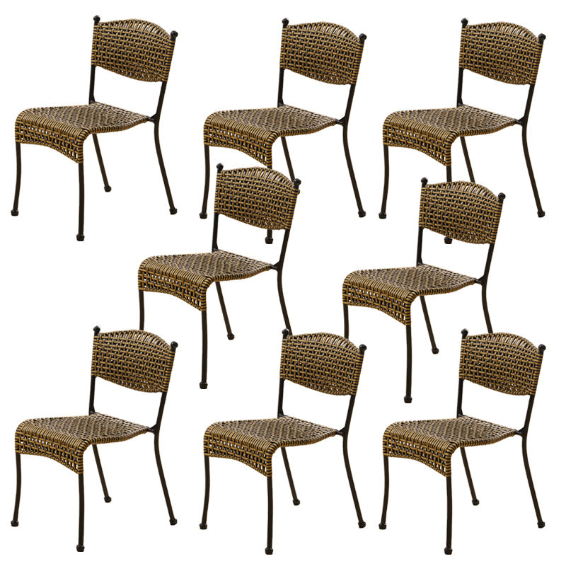 Tropical Dining Side Chair in Brown/Black Plastic with Open Back