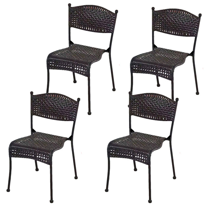 Tropical Dining Side Chair in Brown/Black Plastic with Open Back