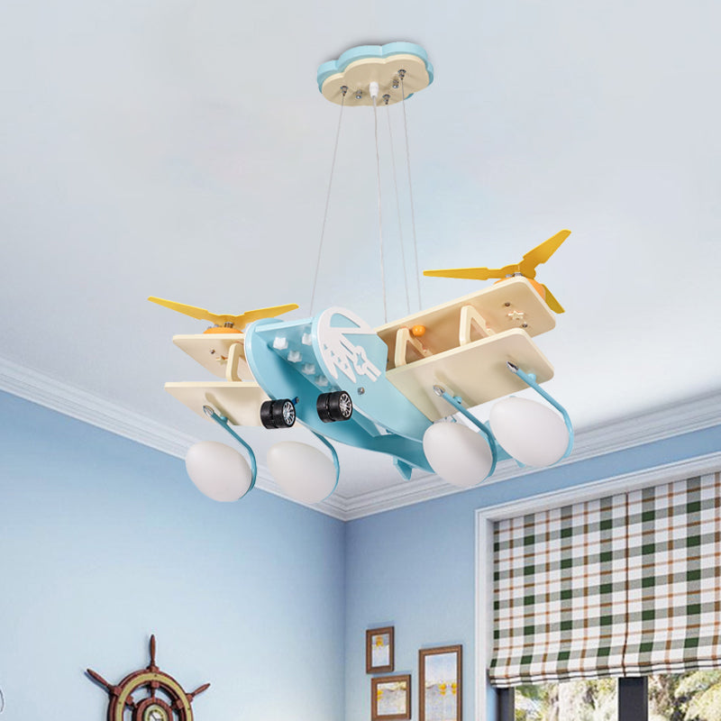 Kids Bomber Plane Wood Drop Lamp 4 Heads Chandelier Pendant Light in Light-Blue with Bomb White Glass Shade