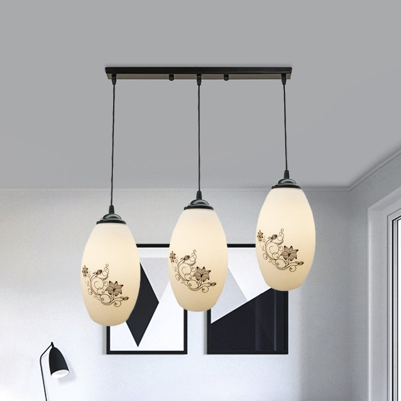 3 Lights Oval Multi-Pendant Modern Black Finish White Printed Glass Ceiling Hang Fixture with Round/Linear Canopy