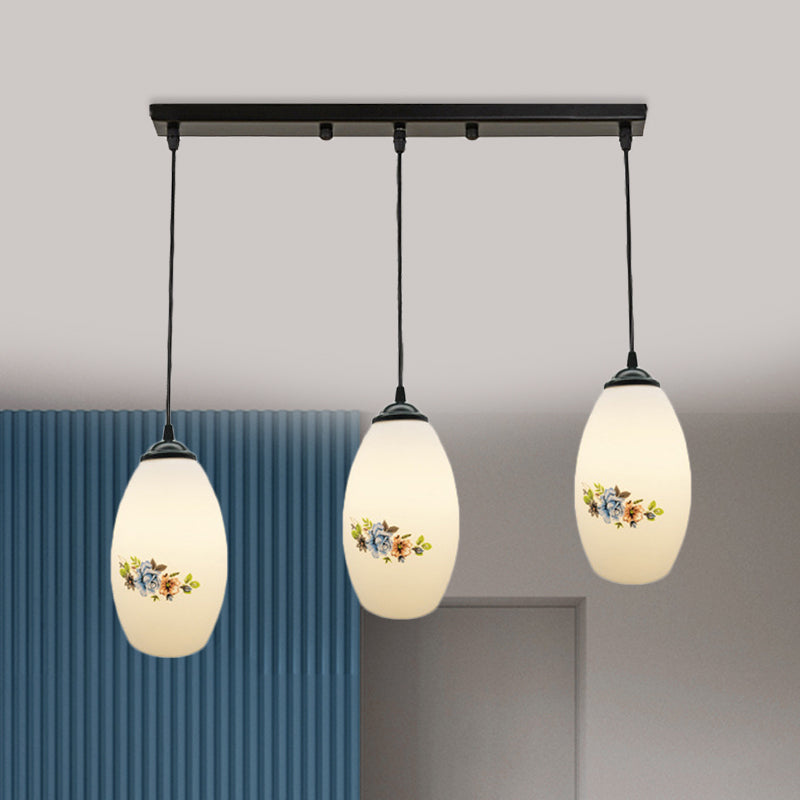 3 Lights Oval Multi-Pendant Modern Black Finish White Printed Glass Ceiling Hang Fixture with Round/Linear Canopy