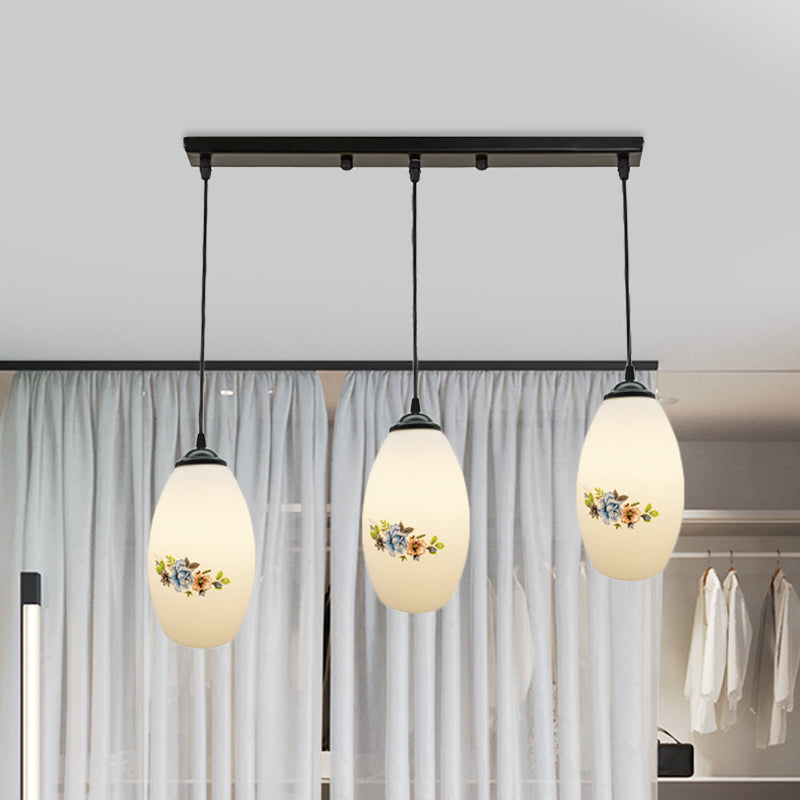 3 Lights Oval Multi-Pendant Modern Black Finish White Printed Glass Ceiling Hang Fixture with Round/Linear Canopy