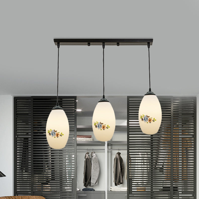 3 Lights Oval Multi-Pendant Modern Black Finish White Printed Glass Ceiling Hang Fixture with Round/Linear Canopy
