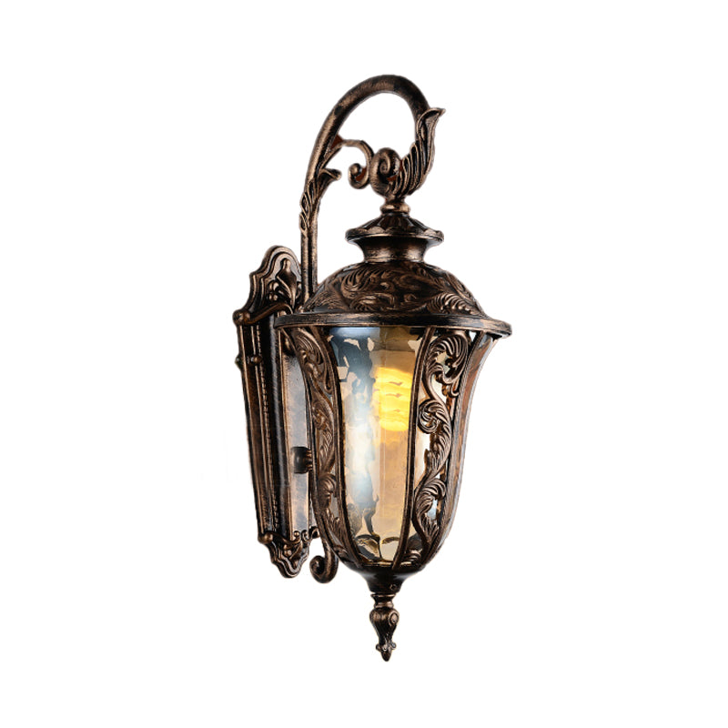 Sconce da parete a braccio curvo in metallo 1 lampada da parete all'aperto leggera in bronzo con tonalità di vetro ambra