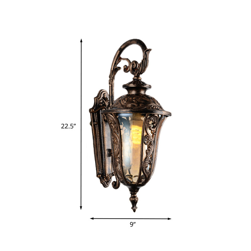 Sconce da parete a braccio curvo in metallo 1 lampada da parete all'aperto leggera in bronzo con tonalità di vetro ambra
