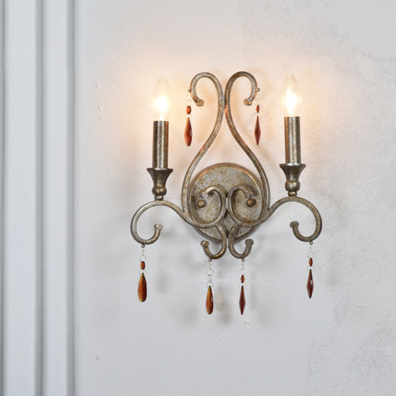 Lampada da parete a 2 teste in argento invecchiato Lampada da parete con candeliere in cristallo ambrato rustico