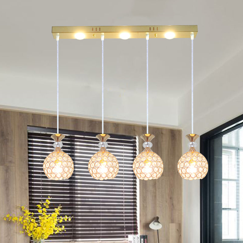 4 Köpfe Esszimmer Multi -Deckenleuchte modernistische Gold -Finish -Pendellampe mit Globuskristall eingebetteter Schatten