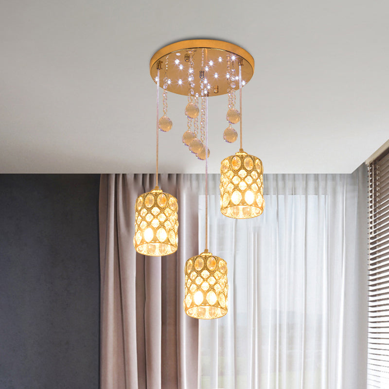 Semplice lampada cilindrica inserita in cristallo appeso a 3 luci cluster ciondolo in oro per camera da letto